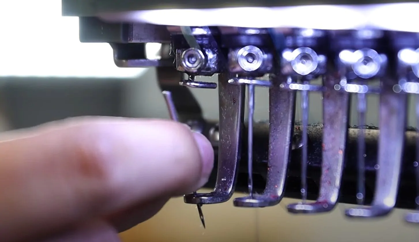 обрив нитки на вишивальній машині